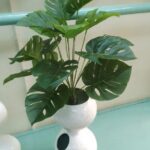 Decorated white gourds flower vases